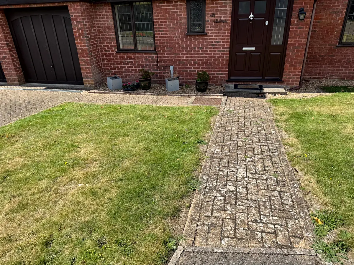 Dirty driveway in Esher, Surrey before pressure washing