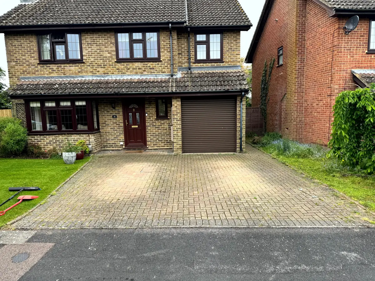 Dirty driveway in Farnham, Surrey before pressure washing