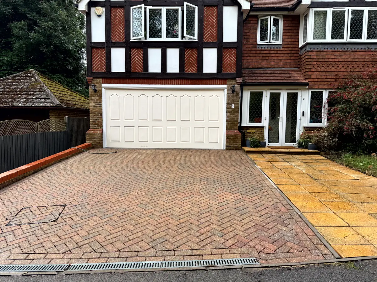 Freshly cleaned block paving driveway at a detached home in Guildford, Surrey