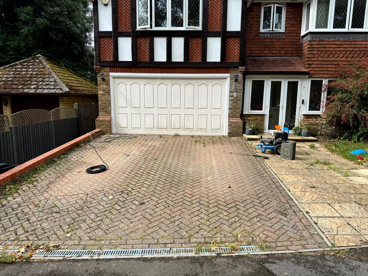 Dirty driveway in Guildford, Surrey before pressure washing