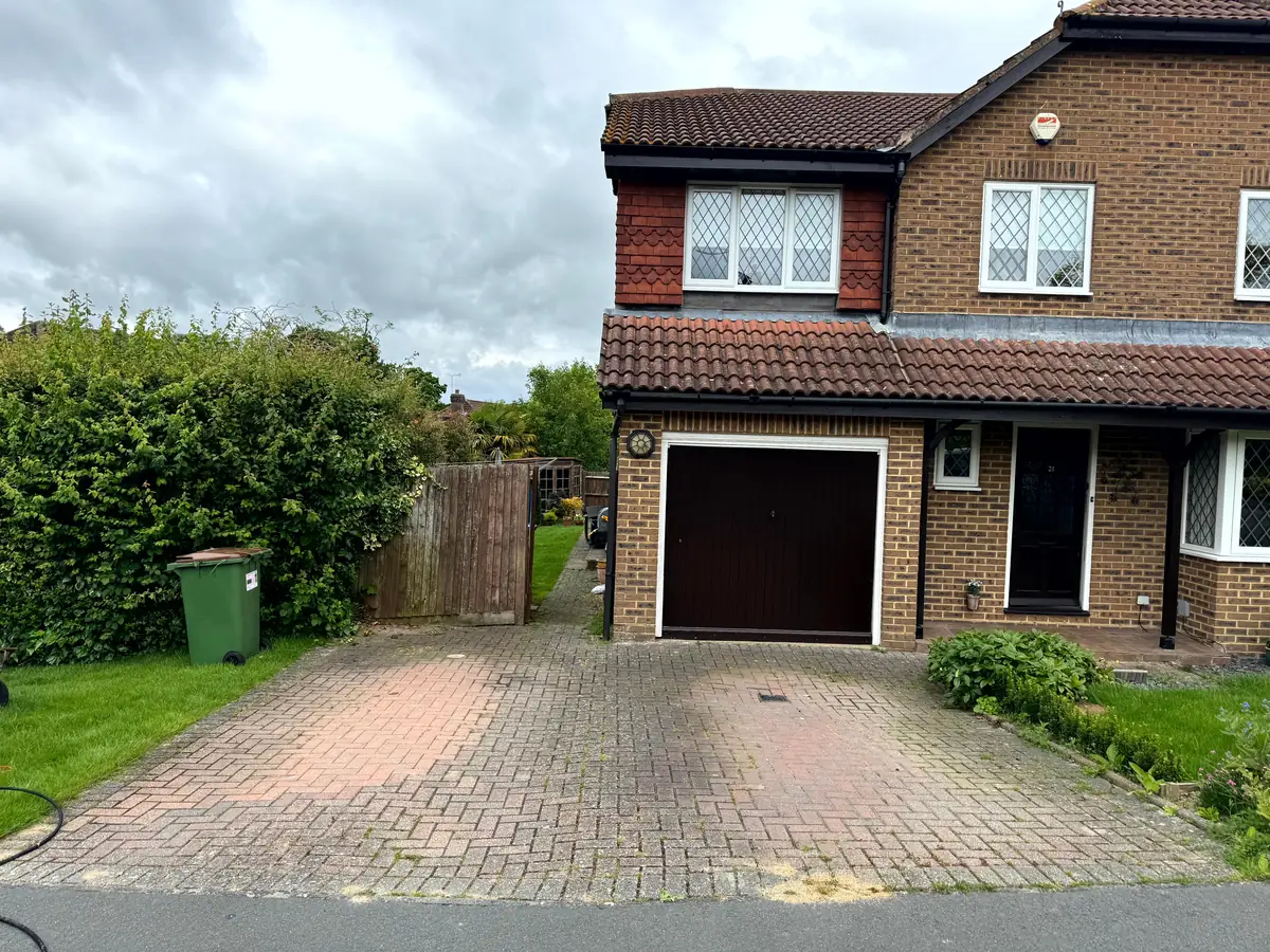 Dirty driveway in Kingswood, Surrey before pressure washing
