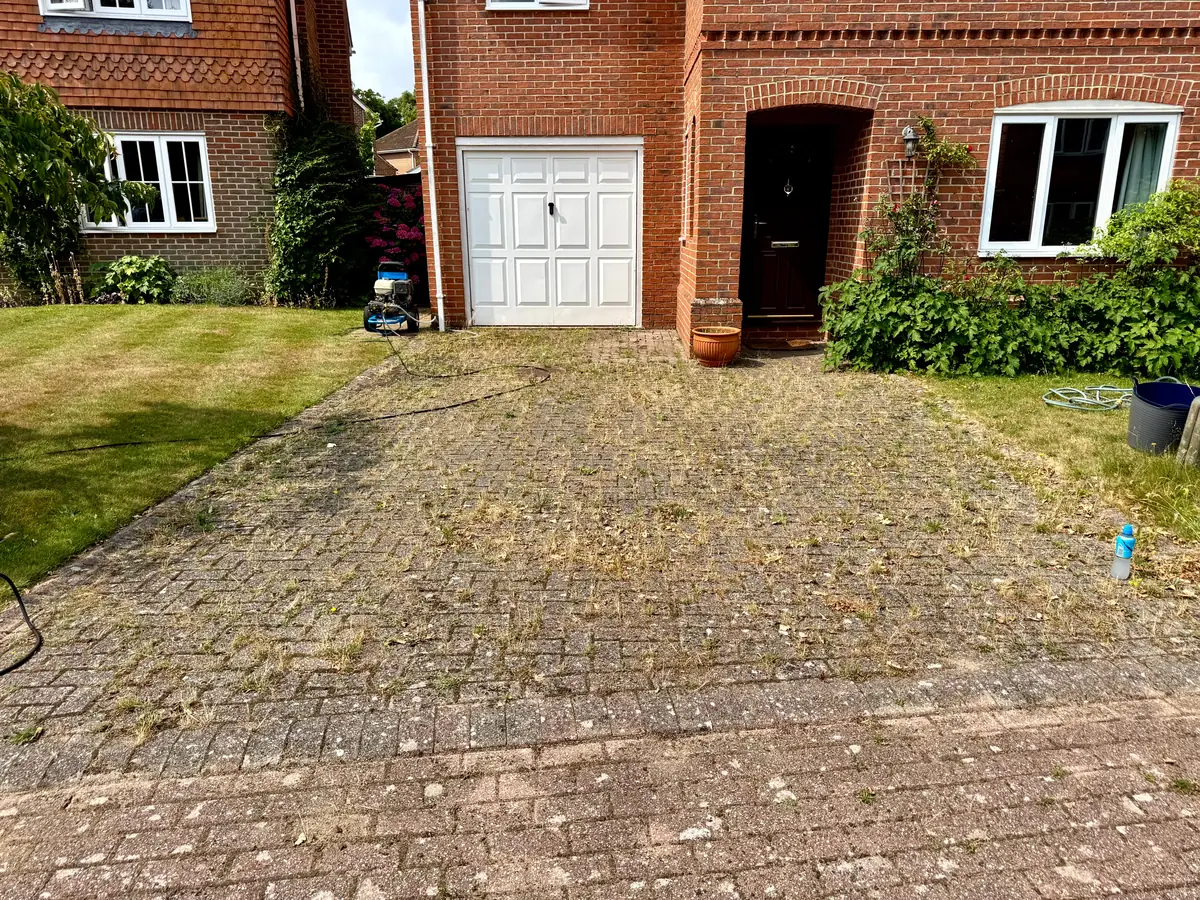 Dirty driveway in Petersfield, Hampshire before pressure washing