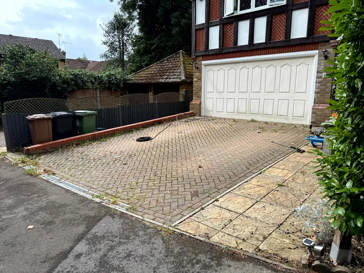 Dirty driveway in Reigate, Surrey before pressure washing